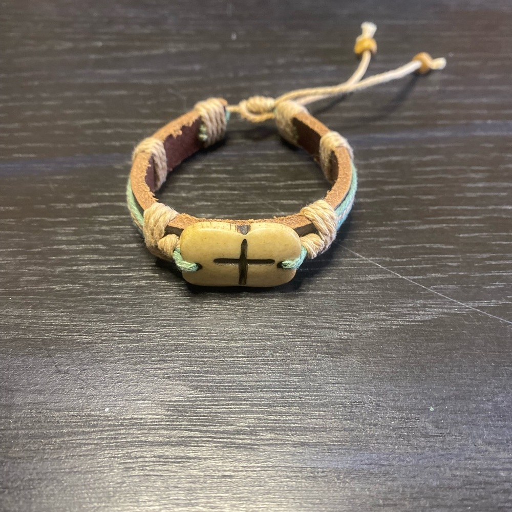 Adjustable leather cross cuff
